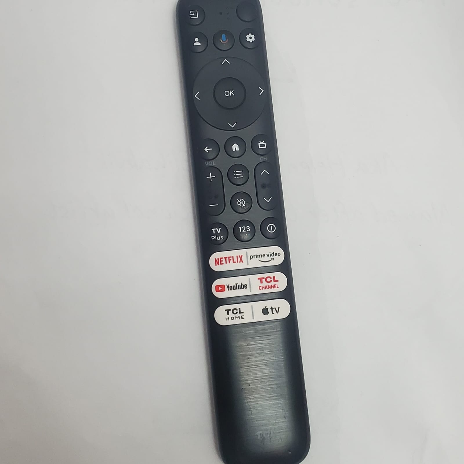 TV Remote:
The buttons made muted rubber clicks when pressed. The plastic casing shifted slightly in my hand.